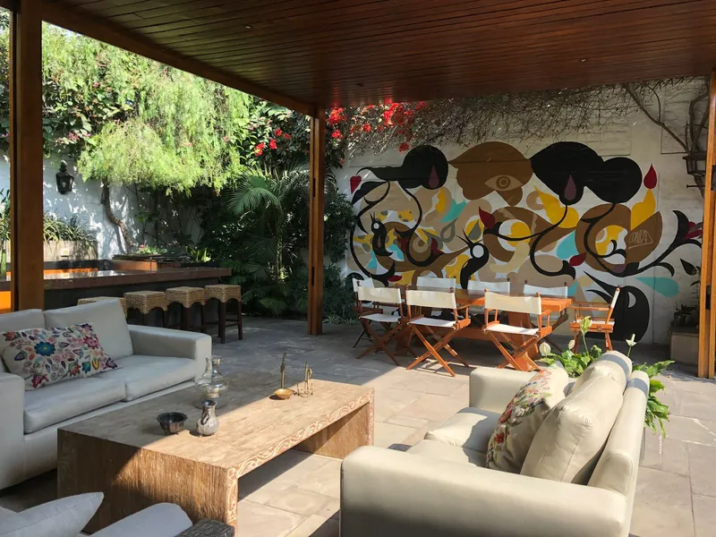 Terraza techada con área de BBQ